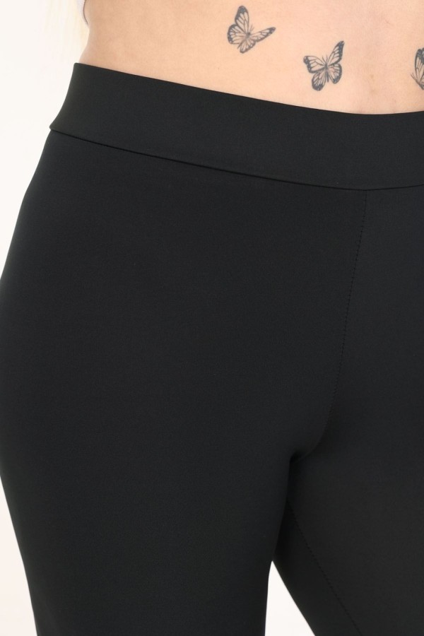 Aptemptos didelių dydžių kelnės